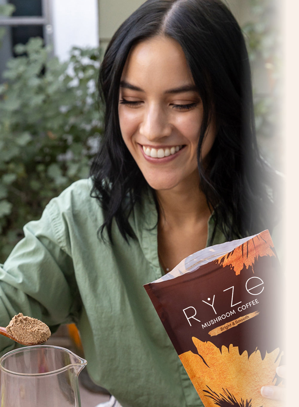 Rachel holding RYZE coffee